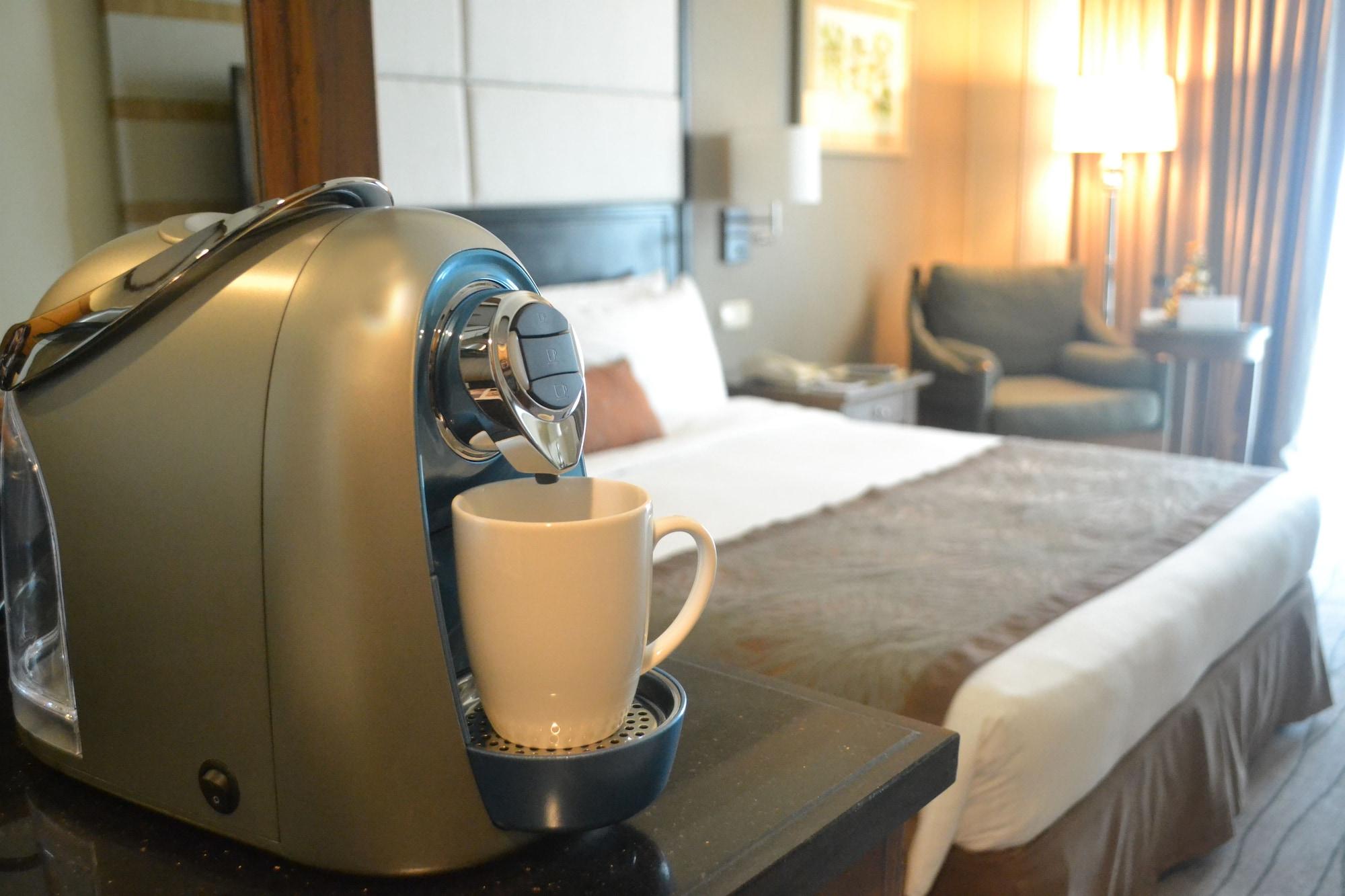 Hotel Marco Polo Davao Exterior foto A Nespresso machine in a hotel room